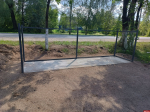 Обустройство контейнерных площадок производят на новоржевском кладбище