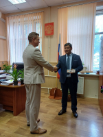 Состоялось торжественное вручение служебного удостоверения заместителю председателя
