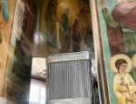 Старинную печь отреставрировали в церкви в Печорах