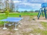 Новые спортивные площадки и сцена появились в трёх деревнях Псковского района